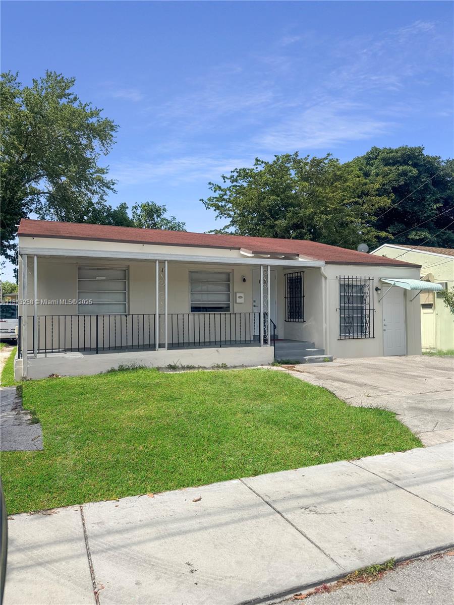 1334 Nw 56th St, Miami, Broward County, Florida - 4 Bedrooms  
3 Bathrooms - 