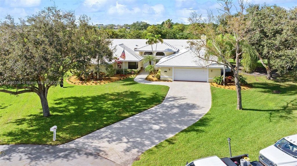 Photo of 11960 SW 43rd St (Acorn Dr.), Davie, FL 33330 (MLS # A11496356)