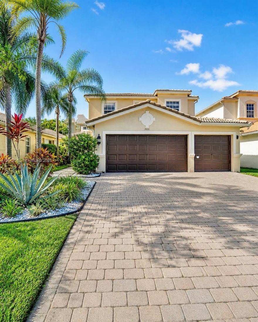 Welcome to 7055 Via Leonardo in Lake Worth Florida, an exceptional residence offering refined living within a prestigious gated community. This beautifully maintained five bedroom three bath home features over 2900 square feet of thoughtfully designed living space, blending elegance with everyday comfort.

The main level offers a desirable bedroom and full bath, ideal for guests or multigenerational living, along with formal dining and a bright open kitchen that serves as the heart of the home. Natural light fills the interior, highlighting the spacious layout and oversized bedrooms throughout. Upstairs, the expansive primary suite provides a private retreat with ample space to relax and unwind, complemented by generously sized guest rooms.

Step outside to a spacious pool area designed for effortless entertaining and serene outdoor living, perfectly suited for enjoying the Florida lifestyle year round. Residents enjoy access to a 24 hour manned gate, clubhouse with social room, heated pool, playground, and fitness center, offering a lifestyle of convenience and luxury.

An exceptional opportunity to own a distinguished home in a sought after community. Schedule your private showing today.
