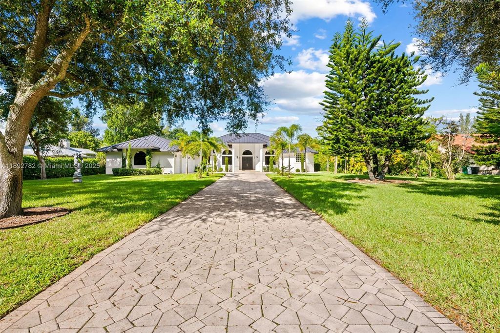 Photo of 6775 NW 65th Terrace, Parkland, FL 33067 (MLS # A11892782)