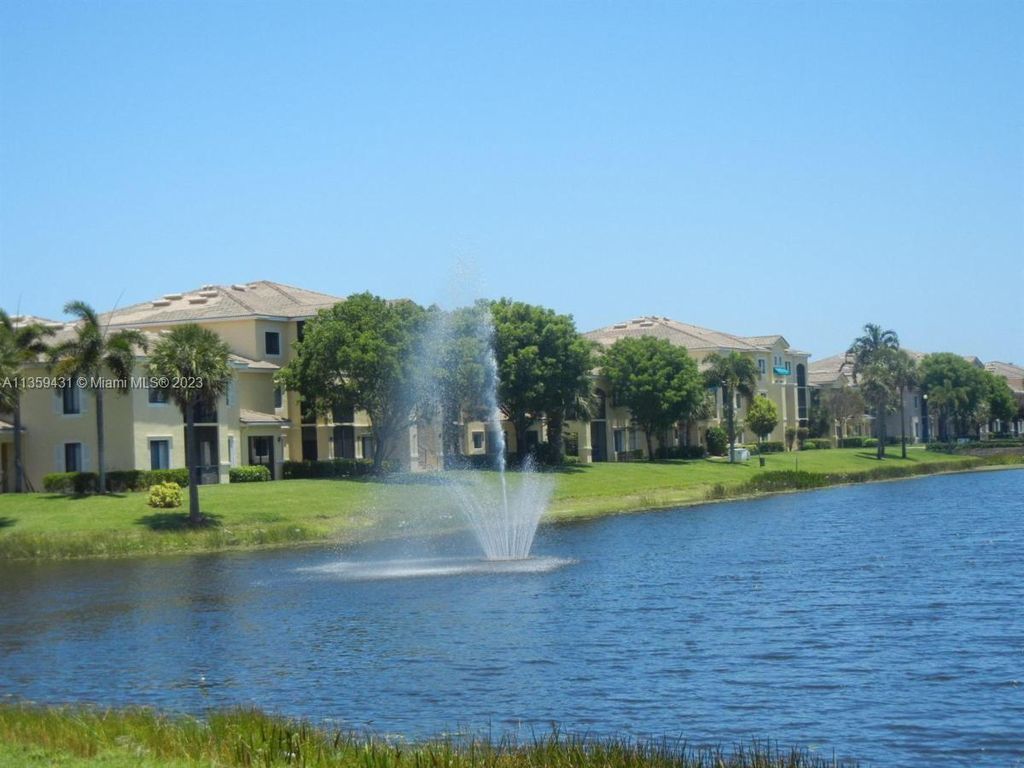 Photo of 2812 Grande Pkwy #107, Palm Beach Gardens, FL 33410 (MLS # A11359431)