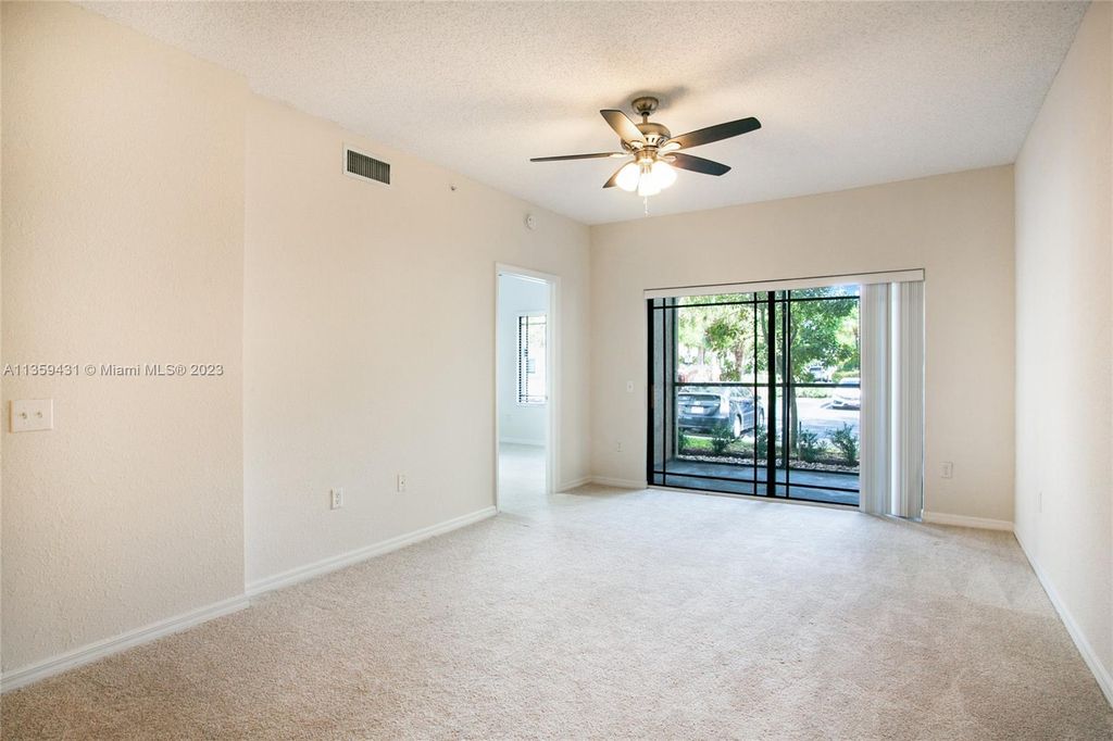 Photo of 2812 Grande Pkwy #107, Palm Beach Gardens, FL 33410 (MLS # A11359431)