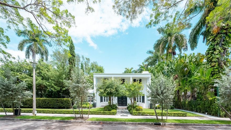 Discover the epitome of luxury living in this exquisite Colonial Villa nestled within the prestigious gated Morningside community. Conveniently situated within walking distance to the upscale Design District and just a short 15-minute drive from both MIA airport and Miami Beach.This modern yet historically remodeled villa boasts 4 bedrooms plus an office and 3.5 bathrooms, offering ample space for both relaxation and productivity.Step into your own private outdoor oasis, complete with lush landscaping and a stunning outdoor kitchen, perfect for entertaining guests or enjoying quiet evenings under the stars. With top-of-the-line finishes and appliances throughout the property, along with a private driveway leading to a 2-car garage and carport indulge in the opulent lifestyle you deserve