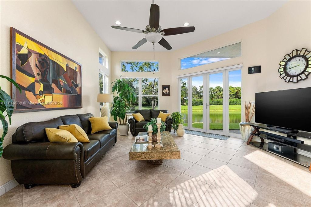 Photo of 11425 NW 75th Mnr, Parkland, FL 33076 (MLS # A11844288)