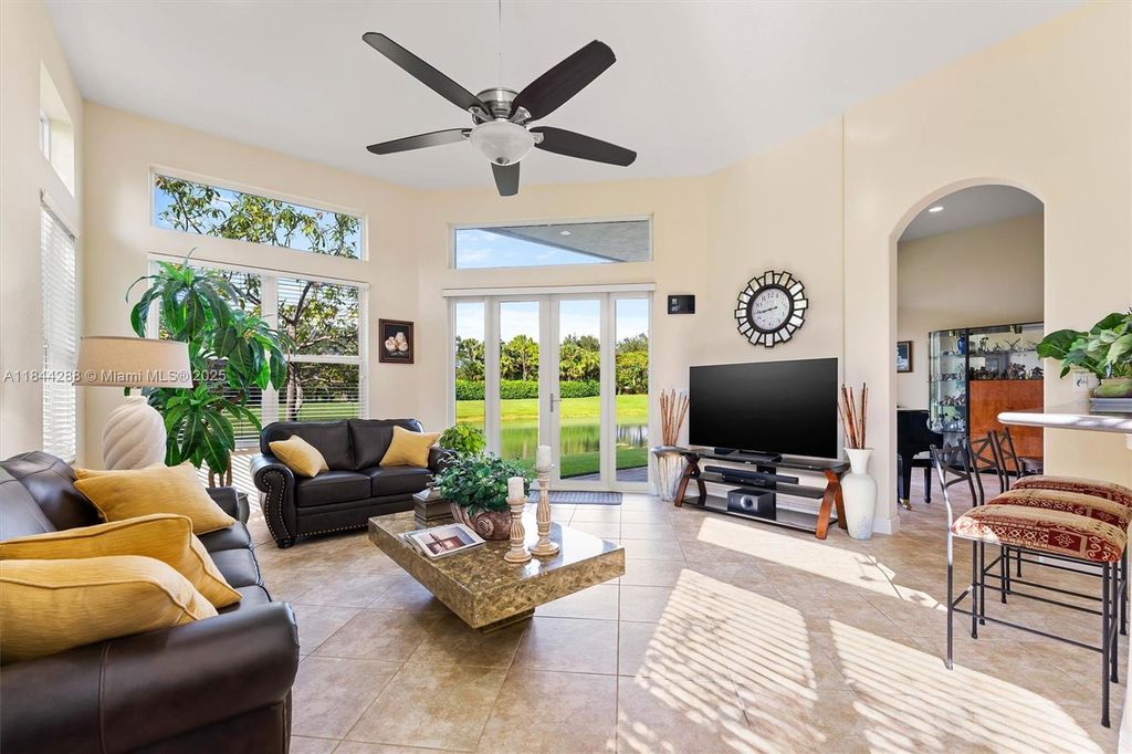 Photo of 11425 NW 75th Mnr, Parkland, FL 33076 (MLS # A11844288)