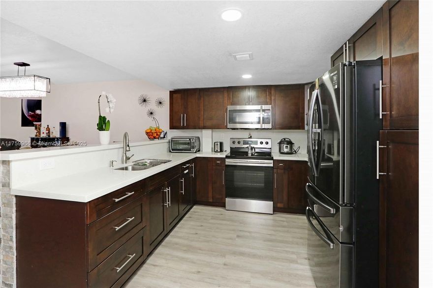 Spacious condo 1 bedroom, 1 bathroom & 1/2 on third floor, 895 TSF, open concept kitchen, stainless steel appliances, it is totally renovated, located in the heart of Kendall Drive, lobby with indoor hallways, plenty of guest parking, an assigned storage bin, a well-maintained clubhouse, tennis courts, gym, a screened wraparound balcony, near to major highways and shopping centers, a placed to call HOME. Very easy to get public transportation, A/C was replaced on 2021, HOA replaced roof in 2023, one assigned parking space with plenty of guest parking spaces! **NO RENTAL ALLOWED BY THE HOA** All showings must be by appointment, Contact L/A ** Do not miss it**