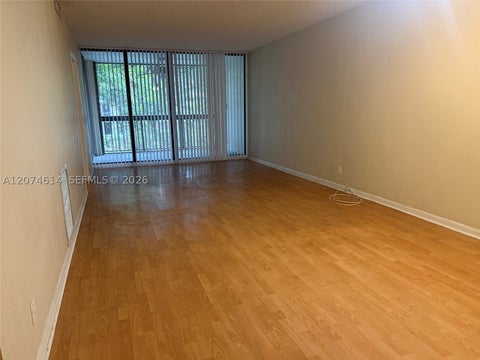 Photo of 3100 Riverside Dr #105, Coral Springs, FL 33065 (MLS # A12074614)