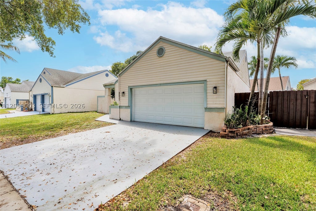 Photo of 8651 SW 12th St, Pembroke Pines, FL 33025 (MLS # A12059003)