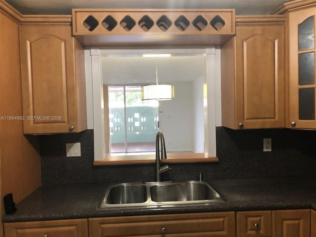 Photo of 404 NW 68th Ave #113, Plantation, FL 33317 (MLS # A11994982)