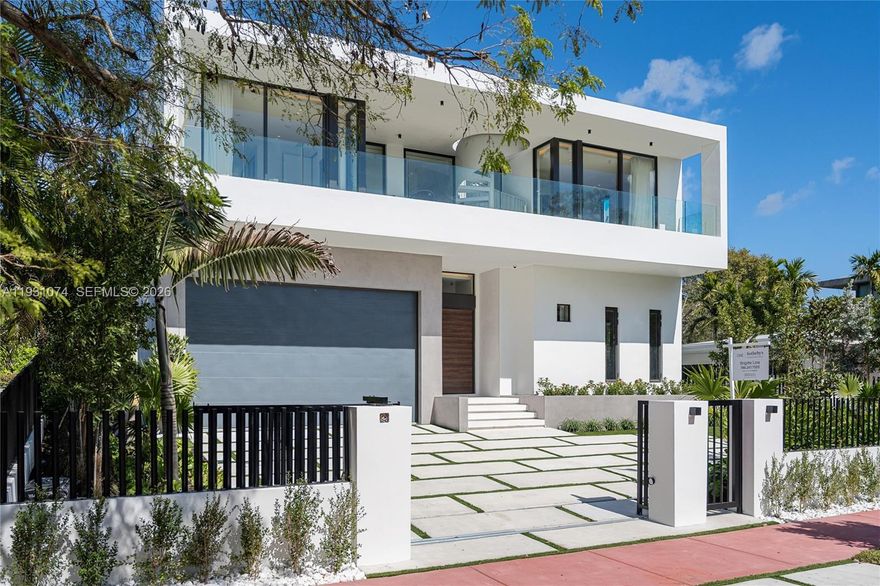 This record-setting new construction in Miami Beach from ABGroup Development is defined by exceptional design and obsessive attention to detail, an approach that earned recognition from the International Property Awards for Architecture & Development. This residence is a sophisticated blend of European refinement, global architectural intelligence, and Miami Beach modernity. This property transcends traditional luxury and stands as a truly international work of art.
Perfectly located on a quiet street, spanning 5,500 SF total, a 5-bedroom, 5-bathroom smart home Features Floor-to-Ceiling glass, private terraces in each room, a rooftop terrace, a private elevator, Summer kitchens, and sun-filled interiors that create an inviting, airy atmosphere while opening to the pool and outdoor living areas with " Zen" landscaping.
Italian designer kitchen features top-tier appliances(Gaggenau) & custom cabinetry. European stone, Versailles-pattern wood floors, and curated architectural details elevate every space with timeless style.
Enjoy the convenience of a private elevator, spa-inspired bathrooms, spacious bedroom suites with a private terrace in each room & integrated smart home. A stunning rooftop terrace offers panoramic views, perfect for sunset cocktails or relaxed evenings under the stars. Additional features include a two-car indoor garage with a charging station, driveway + street parking (can park 8+ cars).
This is more than a home, it’s a refined Miami Beach lifestyle.
