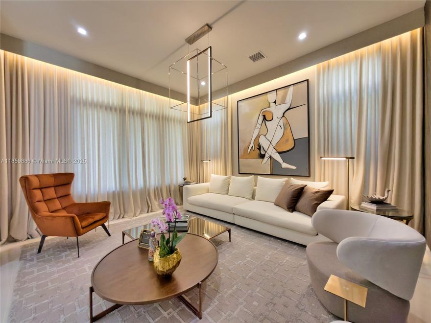 Discover this elegant 4-bed, 4 bath home in the heart of Downtown Doral. Enjoy a private pool oasis perfect for relaxing or entertaining. Every detail is professionally designed with integrated LED lighting and high-end finishes. The gourmet kitchen boasts premium appliances, a quartz waterfall island, and built-in refrigerator. Smart-home tech controls lighting and systems; the primary suite offers electric blackout curtains, private balcony, and spa-style bath. Additional bedrooms have balconies, blackout curtains, and one with en-suite bath. Spacious living, dining, and family areas flow seamlessly. Parking for up to 6 cars includes EV and golf cart charging. Impact windows. Experience the luxury lifestyle you deserve.