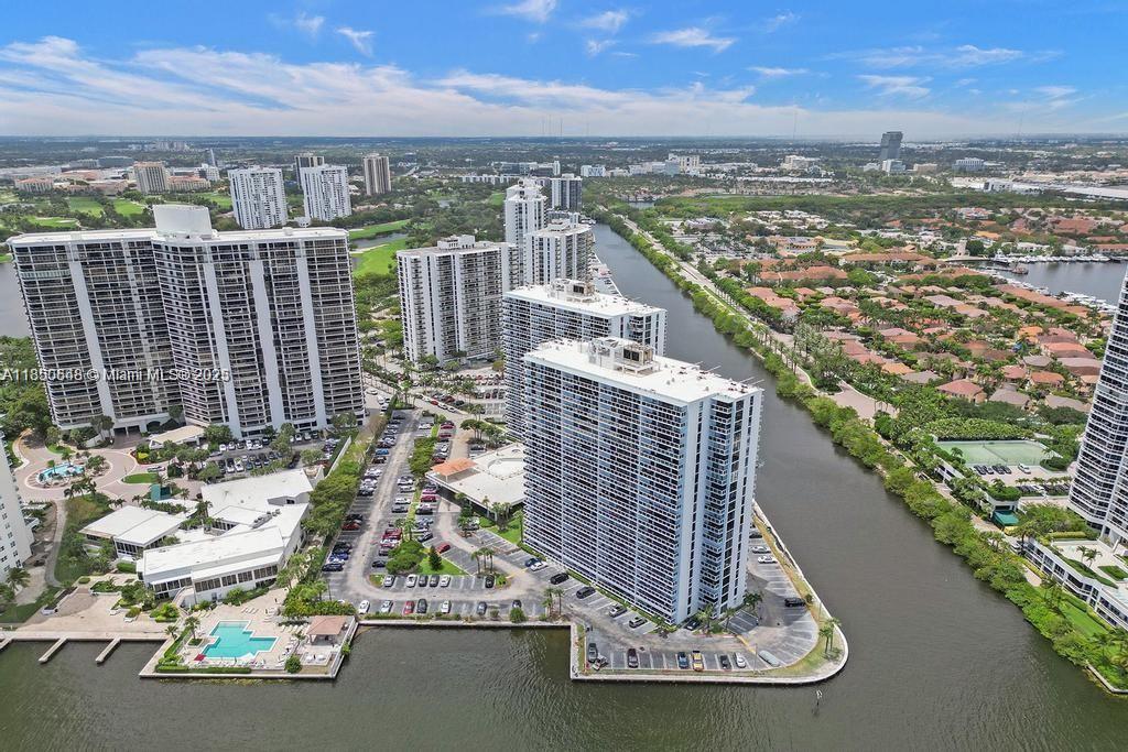 Beautiful 2-bedroom, 2-bath unit with a split floor plan and a large balcony accessible from every room. The unit features tile and wood floors throughout, washer and dryer, and upgraded kitchen and bathrooms. The building offers resort-style amenities: gym, jacuzzi, 24-hour guard gated entrance, concierge, valet parking, and more. The pool is currently under renovation and will be reopened as a luxury resort-style pool. Ideally located in the heart of Aventura, close to Aventura Mall, restaurants, parks, and top-rated A+ schools.