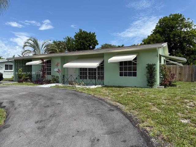 Completely renovated, beautiful pool home close to the beach. New kitchen cabinets, counters and appliances. Totally upgraded baths. Den that can be turned into a 4th bedroom. Spacious backyard. Call today, don't miss out. Will not last.