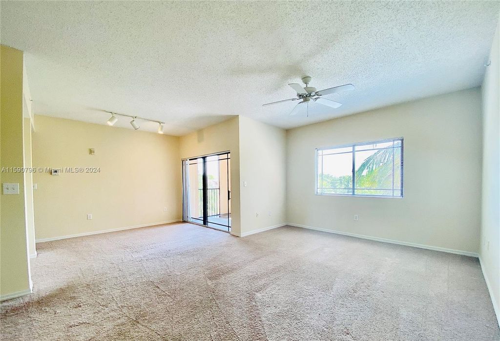 Photo of 2807 Veronia Dr #302, Palm Beach Gardens, FL 33410 (MLS # A11590796)