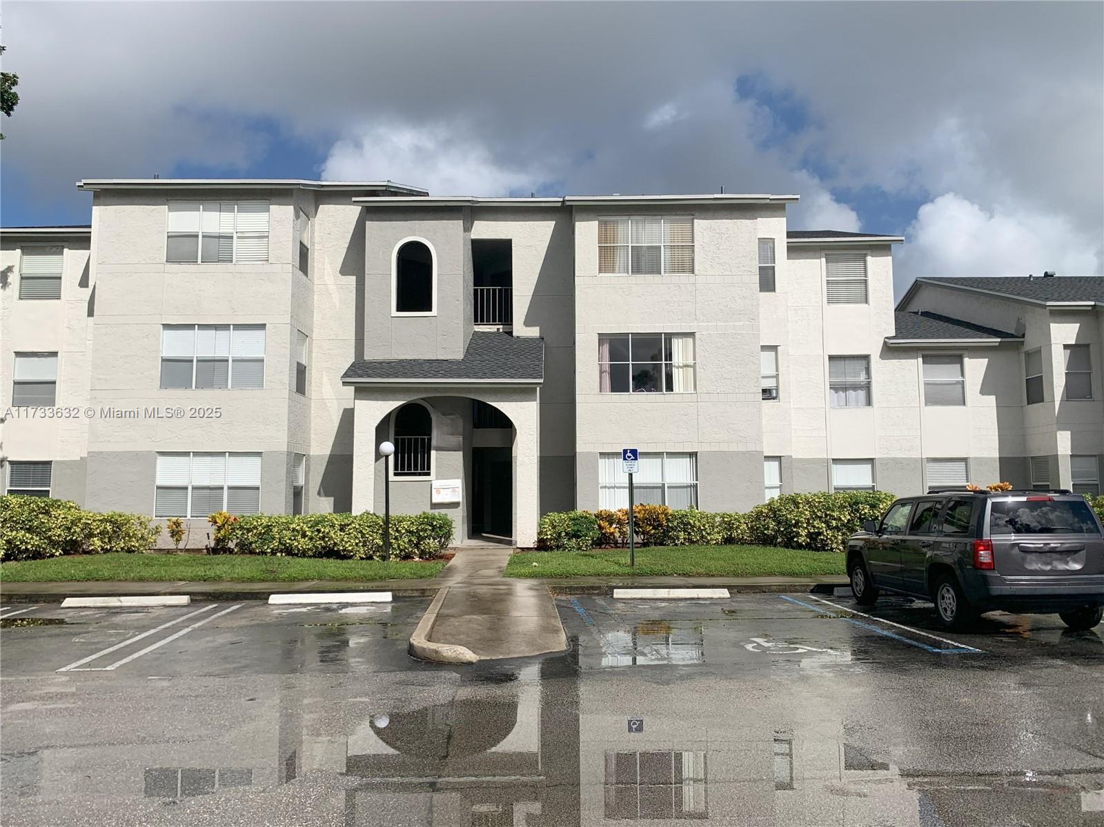 Unit is vacant and easy to show!!!! Discover this beautiful 2-bedroom condo in the heart of West Palm Beach. Spacious-modern, offers ample living space with canal views and an enclosed balcony with French doors. Sleek porcelain tile flooring. The open-concept layout features a stylish kitchen with updated appliances and a full-size washer and dryer for convenience. As an end unit, it offers extra privacy and is steps from the resort-style pool and clubhouse. Residents enjoy two tennis courts, a sand volleyball court, a fitness center, landscaped common areas, and an electric car charging station. Ideally located near shops, supermarkets, and schools, this condo is exceptionally well-maintained. Water, pest control, and regular air filter replacements are included for added ease.