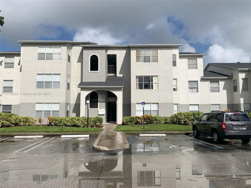 Unit is vacant and easy to show!!!! Discover this beautiful 2-bedroom condo in the heart of West Palm Beach. Spacious-modern, offers ample living space with canal views and an enclosed balcony with French doors. Sleek porcelain tile flooring. The open-concept layout features a stylish kitchen with updated appliances and a full-size washer and dryer for convenience. As an end unit, it offers extra privacy and is steps from the resort-style pool and clubhouse. Residents enjoy two tennis courts, a sand volleyball court, a fitness center, landscaped common areas, and an electric car charging station. Ideally located near shops, supermarkets, and schools, this condo is exceptionally well-maintained. Water, pest control, and regular air filter replacements are included for added ease.