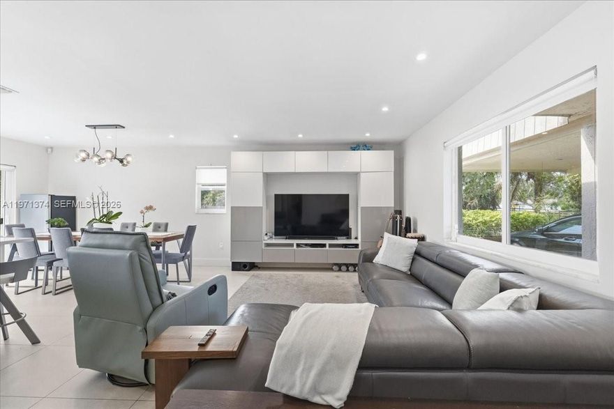 Amazing, centrally located opportunity in South Miami! This fully updated dollhouse is completely move-in ready and checks every box. Featuring impact windows and doors, brand-new appliances, A/C, and beautifully renovated interiors, it offers effortless modern living with timeless charm. Light-filled spaces create a warm, inviting feel, while the expansive backyard provides room for a pool and future expansion. Fruit trees and lush landscaping add privacy and a tropical touch. Situated on a corner lot near South Miami, the Palmetto Expressway, Dadeland, police stations, Publix, and Whole Foods. This is an excellent opportunity for homeowners or investors looking to secure property in a rapidly appreciating area surrounded by new development. The generous lot size offers flexibility to expand, build new, or create your dream outdoor oasis. Whether you’re looking for a primary residence, rental property, or future redevelopment opportunity, this home offers versatility and long-term value in a high-demand location. Surrounded by new construction in one of the next up-and-coming neighborhoods—get in while it’s still affordable. Priced to sell!