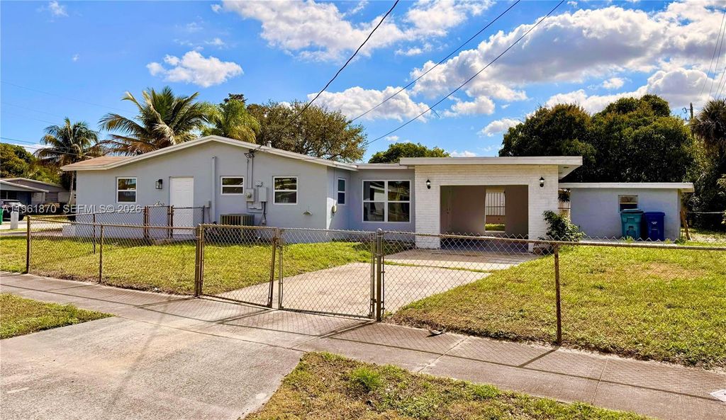 Photo of 931 NW 35th Ave, Lauderhill, FL 33311 (MLS # A11961870)