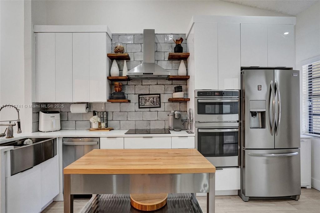 Photo of 3680 NW 83rd Ln, Sunrise, FL 33351 (MLS # A11810741)