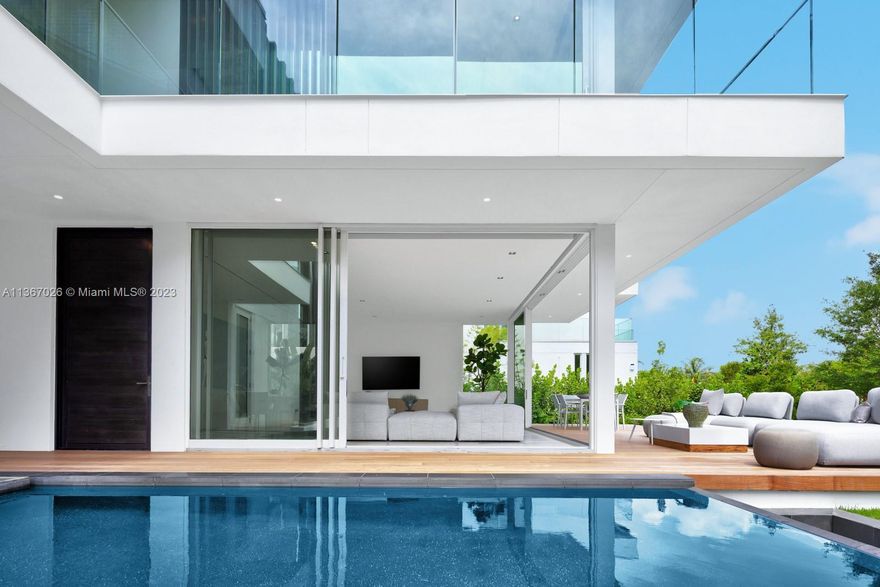Where tropical modern living meets world-class amenities and services, this stunning villa designed by renowned Italian architect, Piero Lissoni has masterfully combined the elegance of design with the natural beauty of Miami Beach. Located within the Ritz Carlton Residences, this home boasts an open-plan layout creating a sense of spaciousness along with sleek furnishings & floor to ceiling windows that allow natural light to flood the living spaces. Features include Boffi & Gaggenau kitchen appliances, stone countertops, a fenced in private yard and impressive range of amenities that cater to your every need. Relax and unwind in your own private pool, take a stroll down to the private marina or enjoy all the services The Ritz Carlton Residences has to offer.