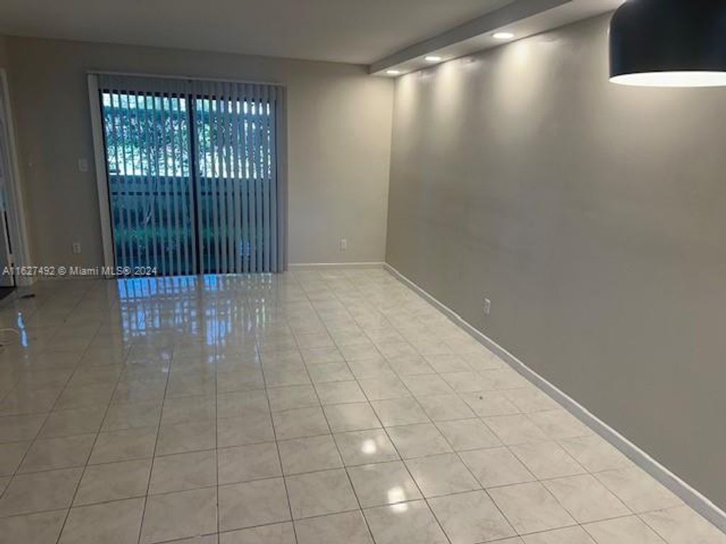 Photo of 9539 Boca Cove Cir #101, Boca Raton, FL 33428 (MLS # A11627492)