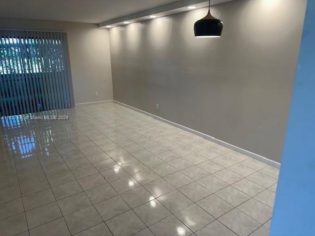 Photo of 9539 Boca Cove Cir #101, Boca Raton, FL 33428 (MLS # A11627492)