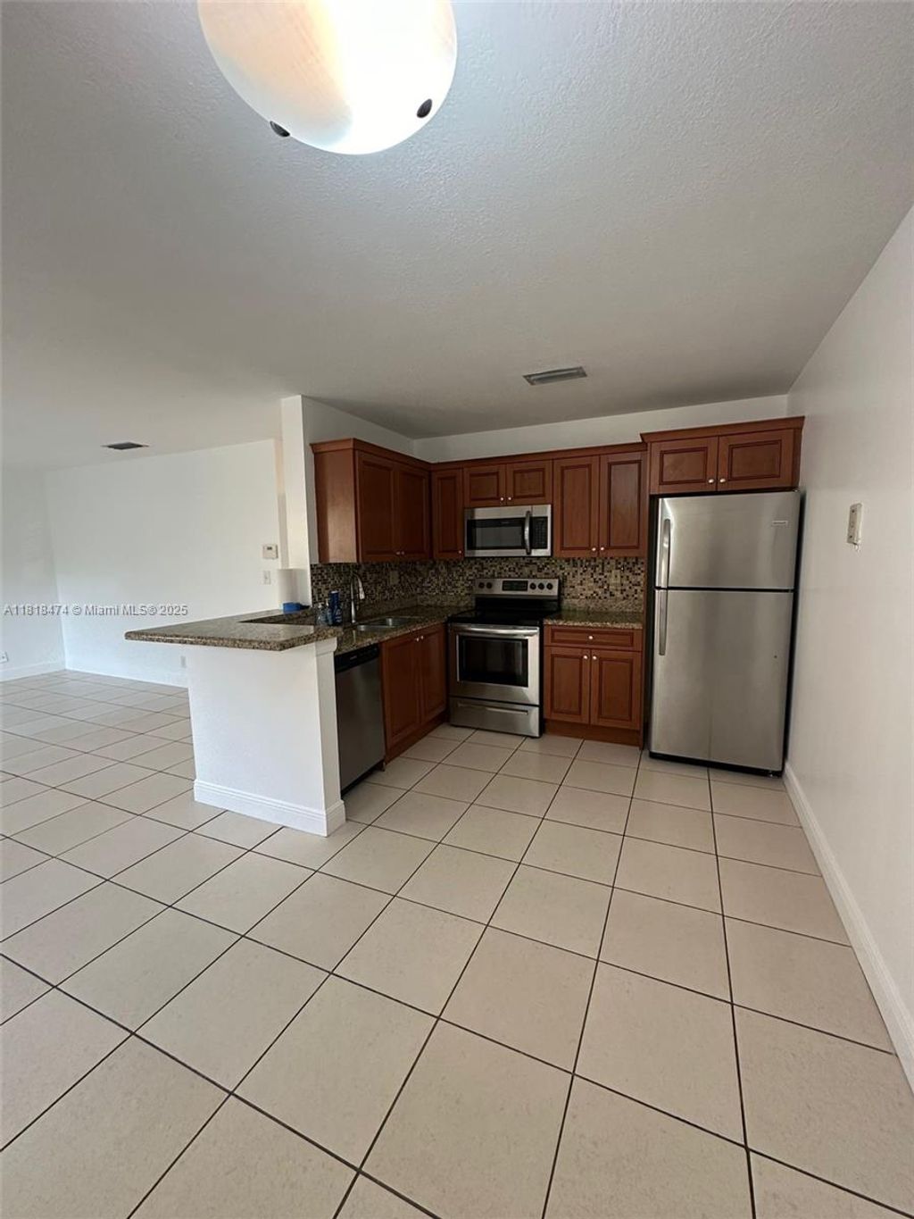 Photo of 11490 NW 43rd St #11490, Coral Springs, FL 33065 (MLS # A11818474)
