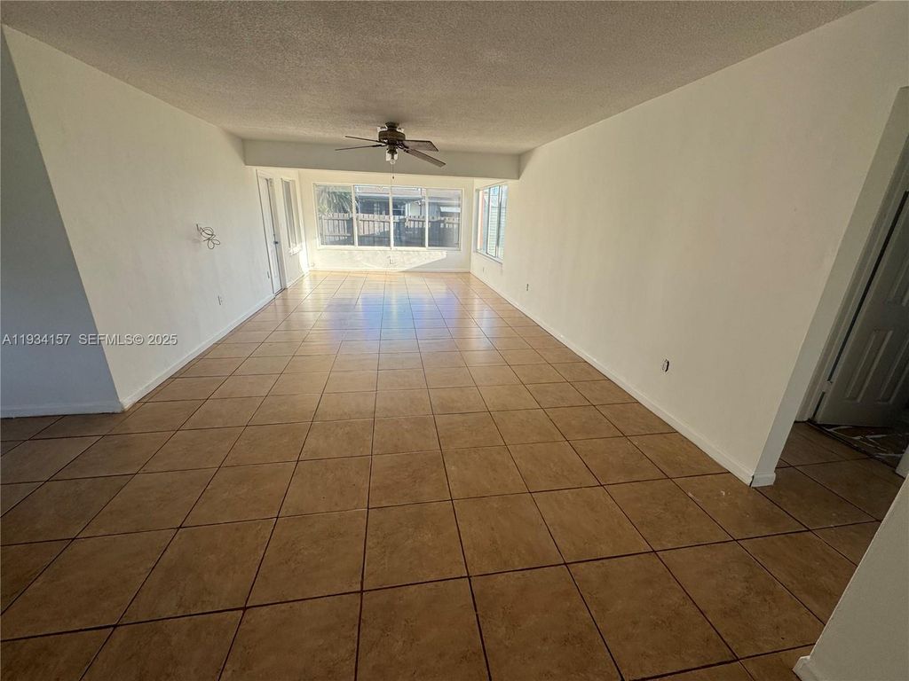 Photo of 8511 NW 11th St, Pembroke Pines, FL 33024 (MLS # A11934157)