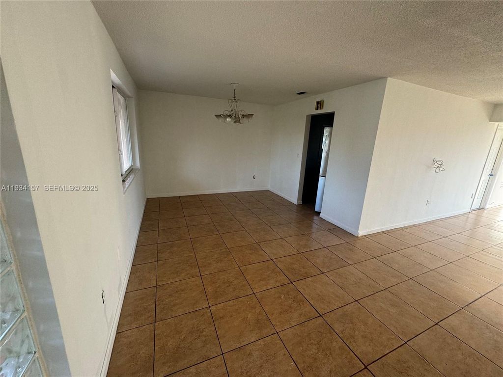 Photo of 8511 NW 11th St, Pembroke Pines, FL 33024 (MLS # A11934157)