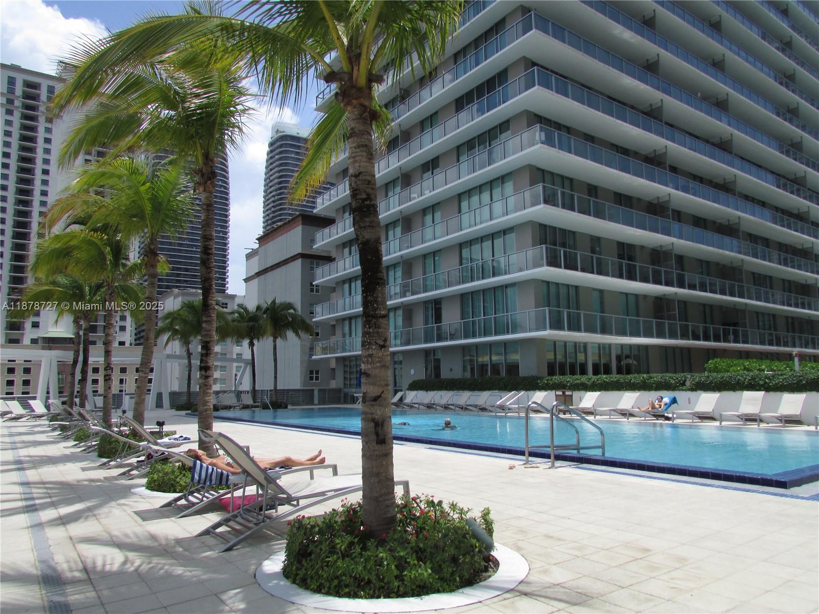 Gorgeous 1/1 Condo unit at the desirable Axis on Brickell Condo. This unit has a perfect layout plan with lots of natural light. WHITE PORCELAIN TILES (no carpet) throughout the unit. Large Balcony with views to the City, Pool and Green Lounge Area. The best of living on The Axis on Brickell is its location and amenities. The condo offers 2 pools, hot tub/spa, cabanas, exterior lounge/relax area, interior lounges, playroom areas, conference room, gym, barbecue area, TV lounge, Billiards and more. The unit comes with 1 assigned parking space even thought this unit is 1 minute walking distance to the Metrorail Station, Restaurants, Bars, Retail and many others. Great opportunity for those who love the City lifestyle.
