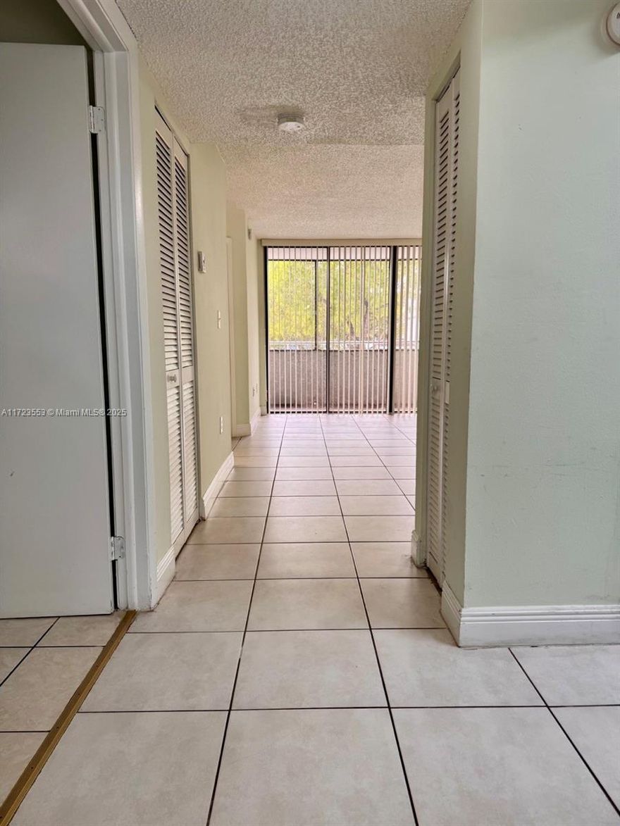 Spacious two bedroom and one bath apartment. Tiled floor and screened balcony. Located in a gated community with two pools, playground, and gym. Close to major highways, parks, shopping, and restaurants. Perfect opportunity!!