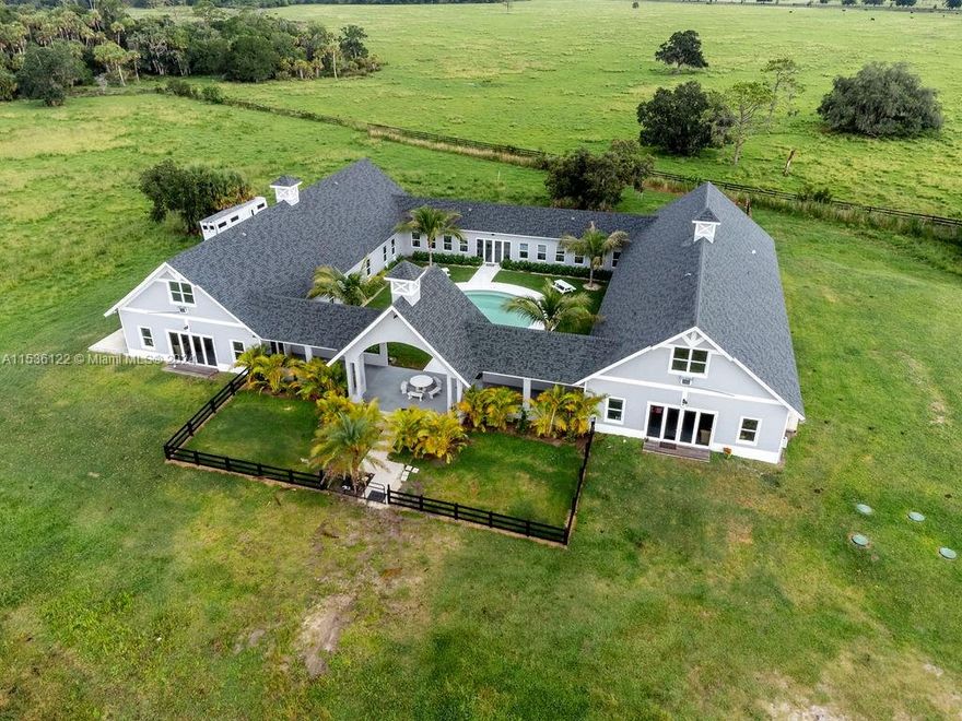 Welcome to "Horse Lover's Paradise Found", a magnificent property on 21.34 acres. This unique property offers a state-of-the-art barn designed for up to 10 horses. Two private second-floor 1BR apartments, each with a living/dining area, kitchen, and walk-in closets. Full kitchen facility/dining area for preparing meals for residents, guests, or staff. The center courtyard has a wading pool and picnic tables. A separate wing of the property has 10 additional private bedrooms. The serene surroundings make this property an excellent choice for an Equestrian Facility. Make this exceptional property your own and embark on a journey where luxury meets equestrian passion.