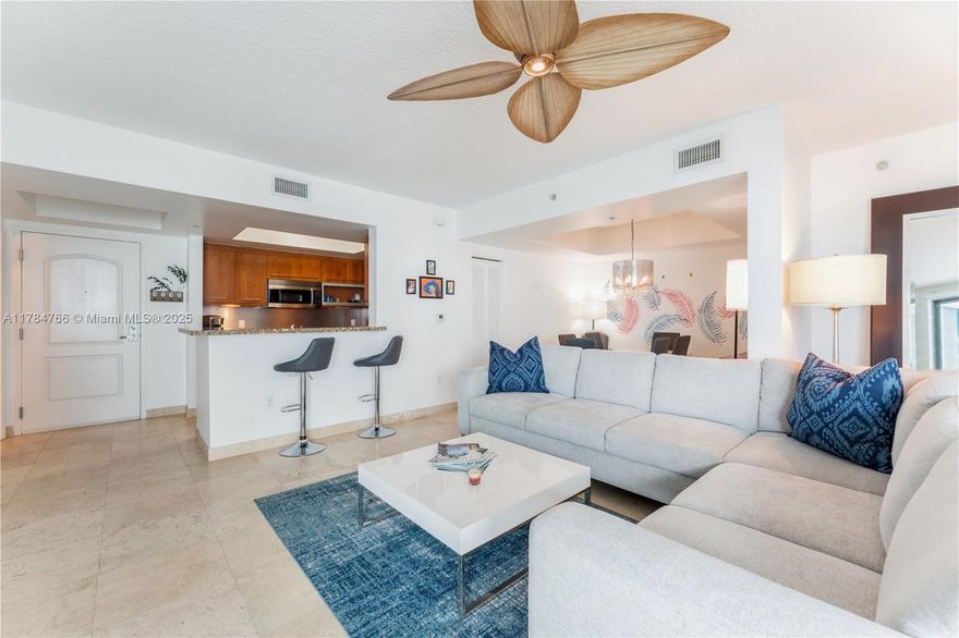 Turnkey and beautifully furnished corner unit at The Cosmopolitan, available May through December 13th. This spacious 2-bedroom plus den overlooks a lush garden and is just 2 blocks from the beach in the prestigious South of Fifth neighborhood. Enjoy proximity to childrens playgrounds and world-renowned restaurants like Carbone, Smith & Wollensky, Joes Stone Crab, and Milos. The building offers top-notch amenities including a pool, hot tub, sauna, gym, club room, and beautifully landscaped gardens. Fully equipped and ready to move in, with one assigned parking space in the garage. No pets allowed. This is the lowest-priced seasonal rental for a unit of this size in South of Fifth. Don’t miss this rare opportunity.