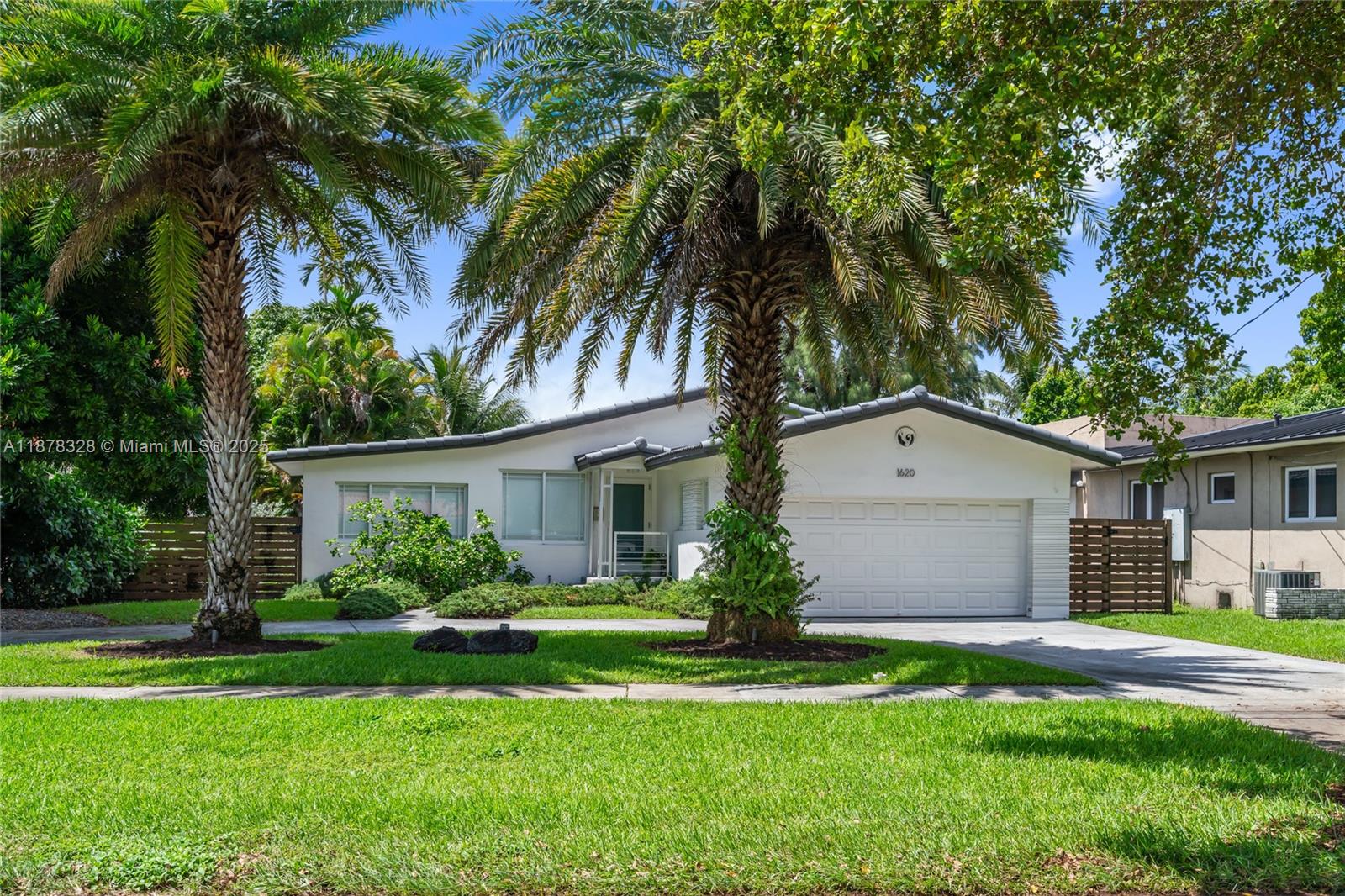 Welcome to this inviting 3 bed, 2 bath, Bass Lake home located in the highly desirable Bird Section of Miami Springs. Nestled on a spacious lot with tranquil lake views, this residence perfectly blends thoughtful updates with timeless original charm. Bright, open living spaces, designed to maintain the character that makes Miami Springs homes so special. The kitchen and baths have been updated, while classic details add warmth and authenticity. Outside, enjoy a new pool set against the serene backdrop of the lake and sunset views. Plenty of room for outdoor entertaining, gardening, or creating your own private oasis. Additional features include a 2-car garage, ample storage, impact windows and doors and a prime location.
