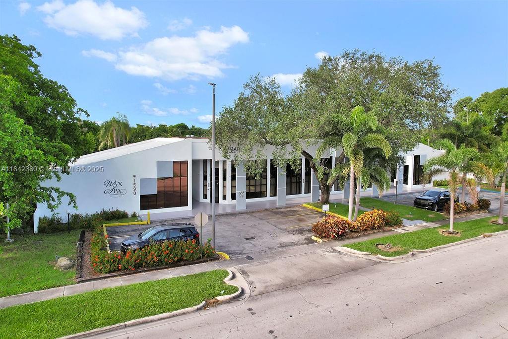 High-end office space fully furnished for lease. Located in North Miami Beach, just off 163rd Street. Over 1,268 Sqft of two-story remodeled and furnished office. Executive Suite with floor-to-ceiling windows on the second floor and a glass-enclosed conference room on the 1st floor. Several workstations are equipped with screens, chairs, tables, and printers. Private entrance and Plenty of employee and guest parking available.