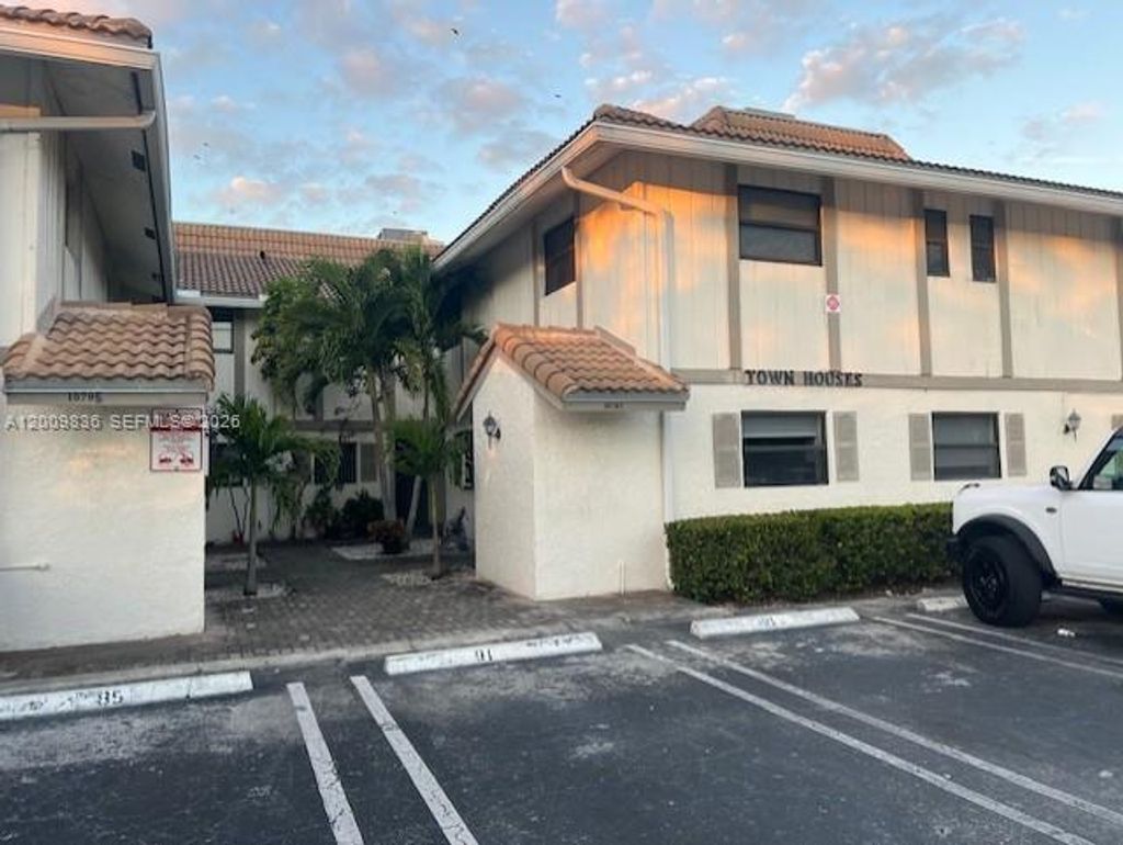 Photo of 10789 Royal Palm Blvd #4, Coral Springs, FL 33065 (MLS # A12009836)