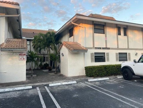Photo of 10789 Royal Palm Blvd #4, Coral Springs, FL 33065 (MLS # A12009836)