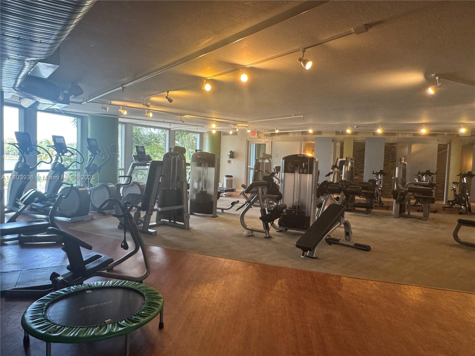 TAO SAWGRASS CONDOMINIUM - Residential