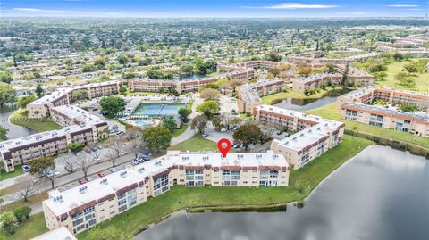 Photo of 2811 N Pine Island Rd #302, Sunrise, FL 33322 (MLS # A11741773)