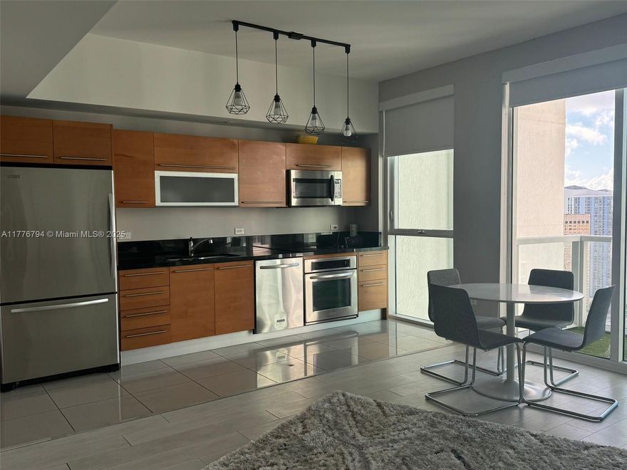 BEAUTIFUL STUDIO WITH PARTIAL CITY AND OCEAN VIEW.
