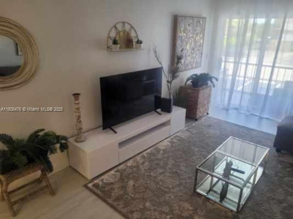 Photo of 300 Golden Isles Dr #217, Hallandale Beach, FL 33009 (MLS # A11808476)