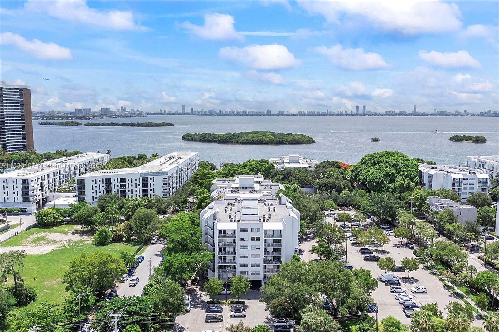 Renovated Modern 1-Bed Oasis in Gated Waterfront Community in MiMo Experience resort-style living in this stylish 1-bedroom, 1-bath condo located in the gated Nirvana community in Miami’s Upper East Side. This move-in-ready fully renovated unit features an open layout, updated kitchen with stainless steel appliances, ceramic floors, and impact windows, a long a private balcony. Enjoy lush tropical grounds and top-tier amenities including two pools, a jacuzzi, gym, BBQ area, kayak launch, and on-site café. Just minutes from MiMo District, Midtown, Wynwood, and the beach, with easy access to I-95 and the airport—ideal for homeowners or investors seeking comfort, convenience, and lifestyle. Schedule your tour today!