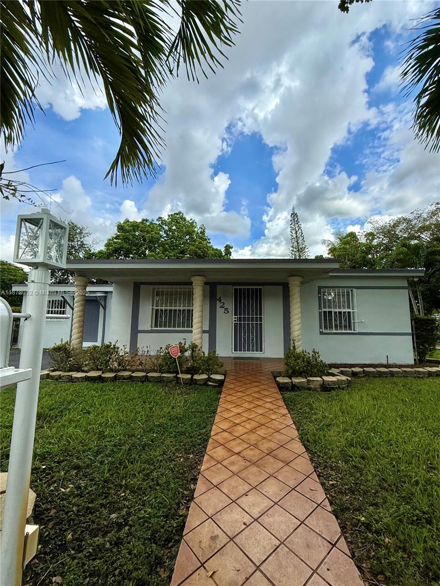 3-bedroom, 2-bathroom single-story corner home in North Miami featuring a spacious layout, tile floors throughout, and a dedicated laundry room with washer and dryer. The property offers abundant parking with a front driveway and gated side parking, plus a large yard with a covered porch perfect for outdoor dining and relaxation. Conveniently located just minutes from I-95 and the Golden Glades Interchange, this home provides quick access to Haulover Beach, Jackson North, Aventura Mall, and both Miami and Fort Lauderdale airports. Tenant(s) must purchase and maintain renters insurance throughout the term of the lease. No RVs, boats, or pets allowed.
