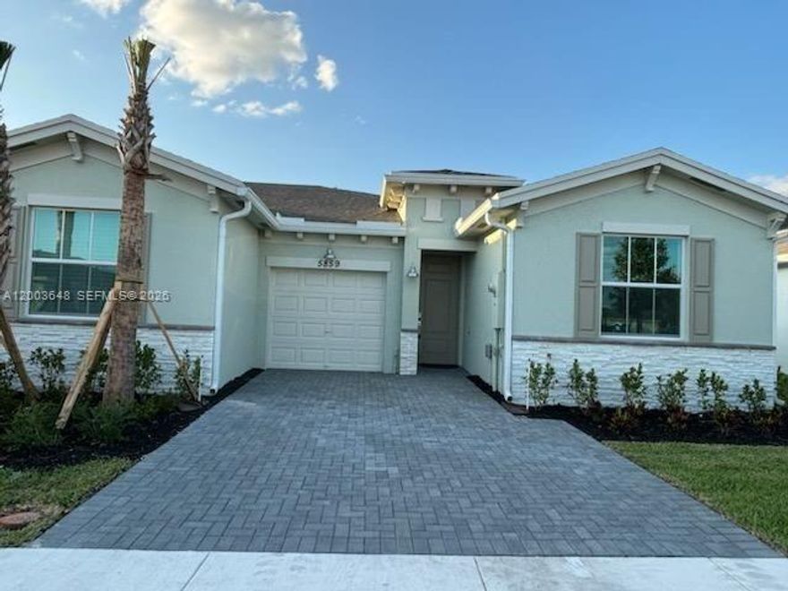 Practically brand new 3 bedroom, 2 bath end unit villa with lake views. The property includes a gourmet kitchen with 42 inch cabinets, SS appliances, pantry with quartz counters that are perfect for bar seating. Impact windows & doors, as well as luxury Vinyl Plank floors throughout. All rooms have ceiling fans/lights & privacy blinds installed. Attached 1 car garage & large driveway with a guest parking lot across the street. It has smart home features such as Ring security system and Honeywell thermostat. Also private covered patio overlooking the water views. Close to the beach & downtown Atlantic Ave for shopping and fine dining. Active 55+ community with state of the art clubhouse. Landscape maintenance & fiber internet included.