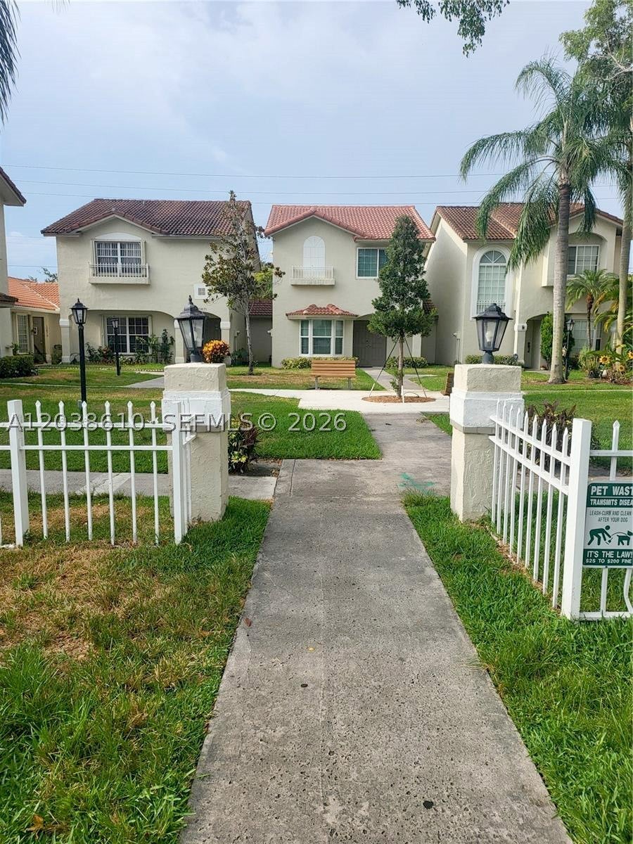 Photo of 10877 NW 8th St, Pembroke Pines, FL 33026 (MLS # A12038610)