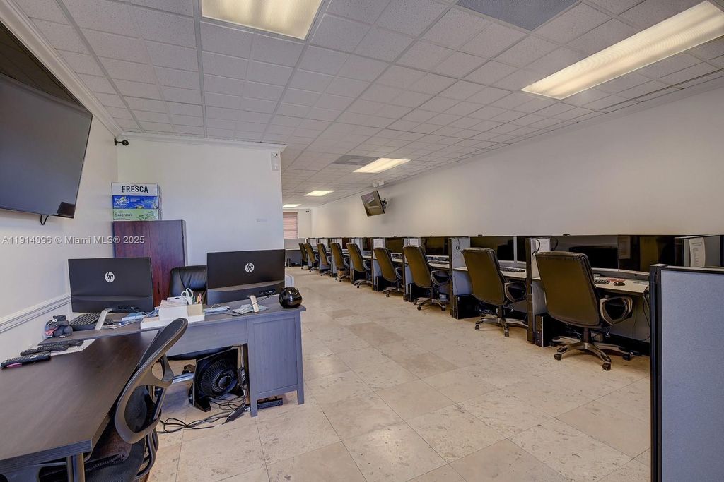 Photo of 5220 S University Dr #203C, Davie, FL 33328 (MLS # A11914096)