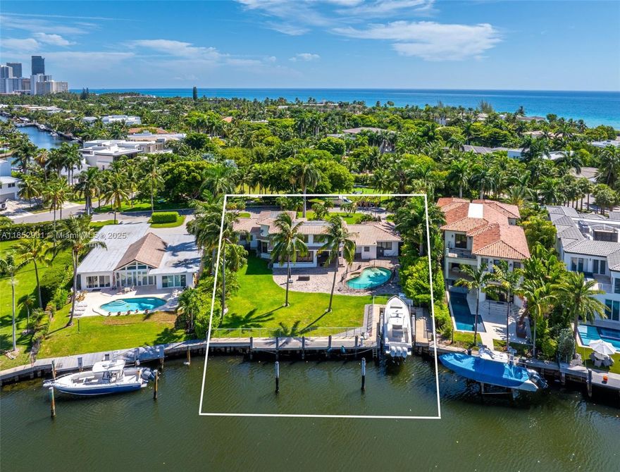 Welcome to 268 South Parkway, arguably the finest location in all of Golden Beach. This 20,951 sq ft estate sits between a lush, sprawling park out front and wide open water views out back, offering a sense of space, privacy, and calm that’s unmatched. With 90 ft of waterfront and a rare built-in boat slip, it’s a boater’s dream wrapped in tropical serenity. Palm-lined sidewalks lead you to private beaches and parks, while the view from your doorstep is nothing but green. There’s only one address like this - 268 isn’t just rare, it’s irreplaceable.