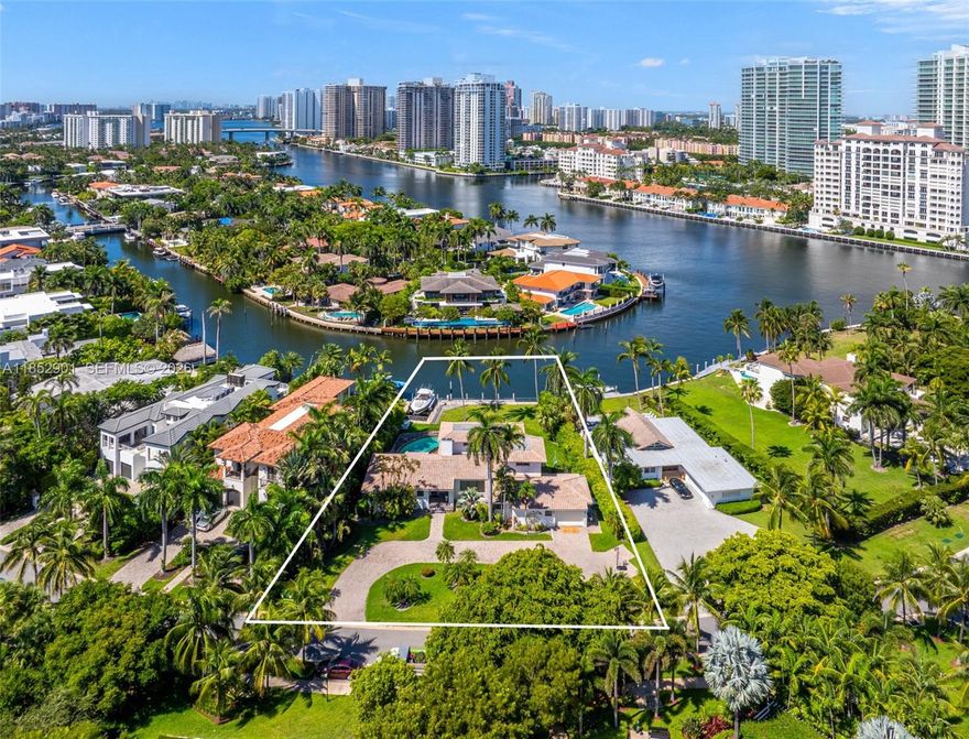 Welcome to 268 South Parkway, arguably the finest location in all of Golden Beach. This 20,951 sq ft estate sits between a lush, sprawling park out front and wide open water views out back, offering a sense of space, privacy, and calm that’s unmatched. With 90 ft of waterfront and a rare built-in boat slip, it’s a boater’s dream wrapped in tropical serenity, situated just off of the Intracoastal Waterway, with Ocean Access to the Bakers Haulover Inlet or Port Everglades Inlet, Palm-lined sidewalks lead you to private beaches and parks, while the view from your doorstep is nothing but green. There’s only one address like this - 268 isn’t just rare, it’s irreplaceable.