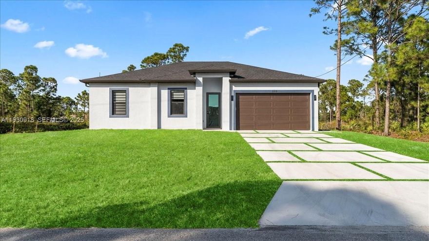 Welcome to modern new construction of single family this 3-bedroom, 2-bathroom home located in a prime area of Lehigh Acres, near SR-82. It boasts 1,270 square feet of living space and 1,699 square feet of total built-in area. This property offers an spacious living and dining areas, and a two-car garage for added convenience. Enjoy Florida living with a large backyard, perfect for gardening, pets, or future exterior improvements.