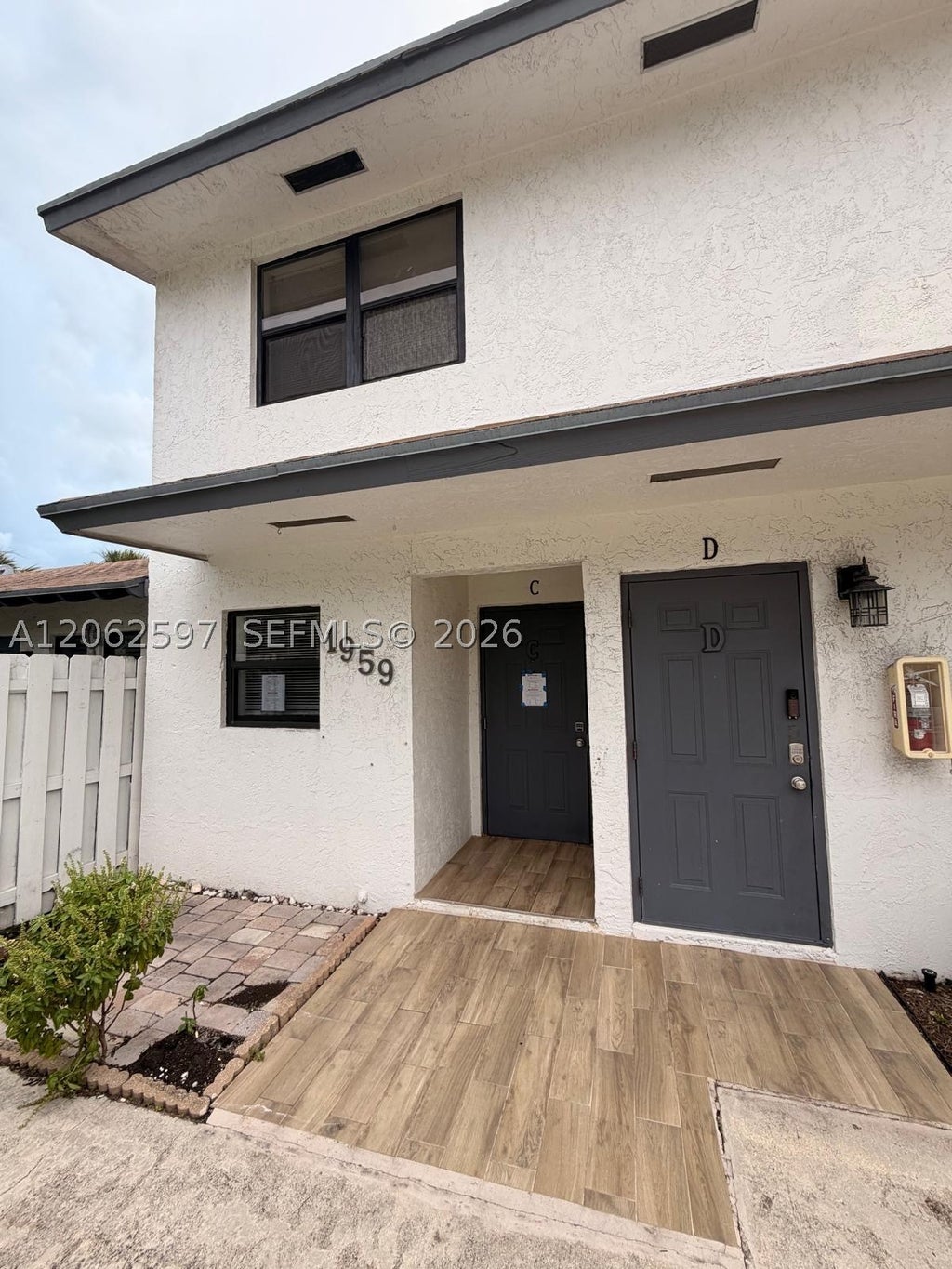 Photo of 1959 SE 3rd St #C, Deerfield Beach, FL 33441 (MLS # A12062597)